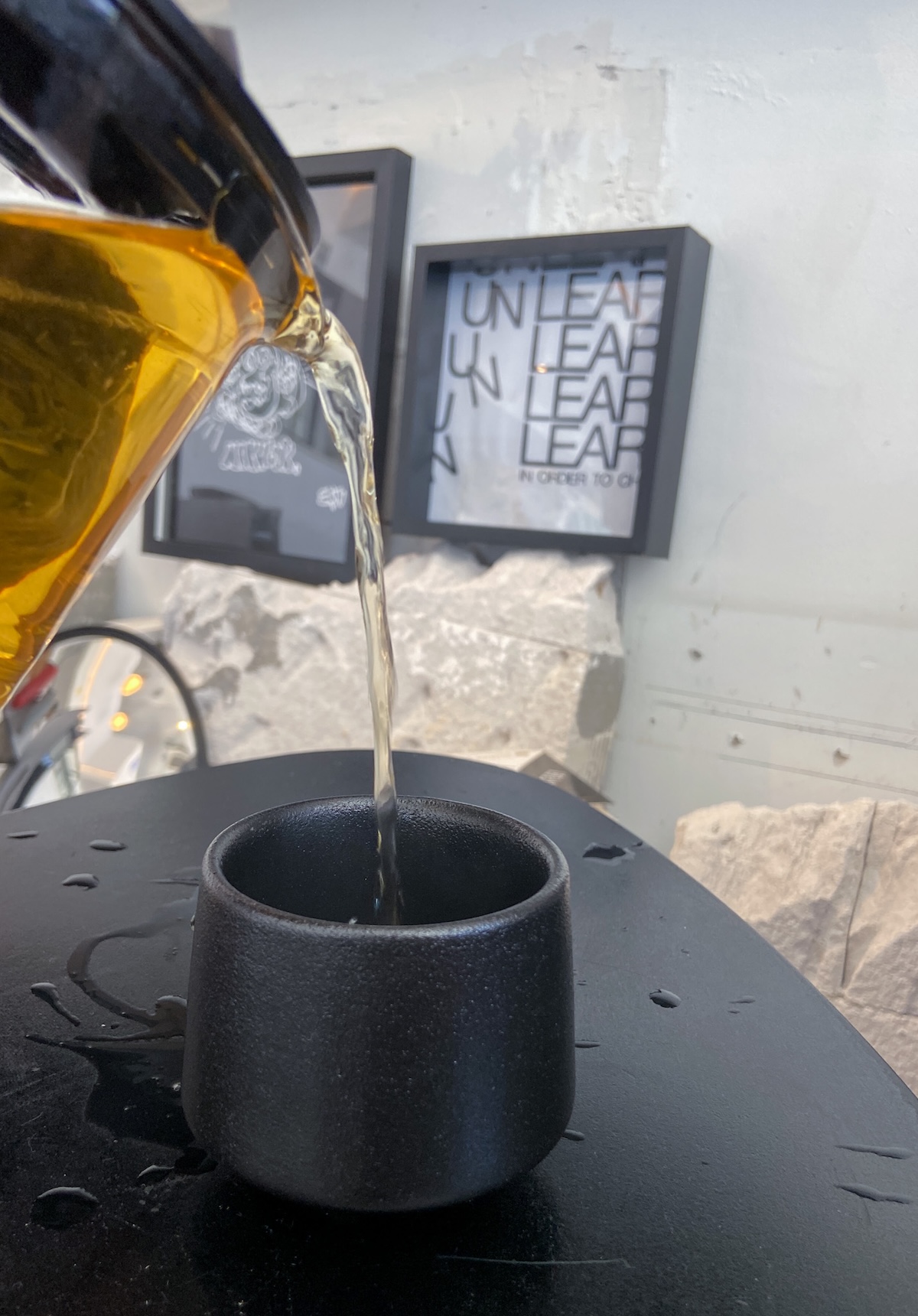 Tea being poured into a cup