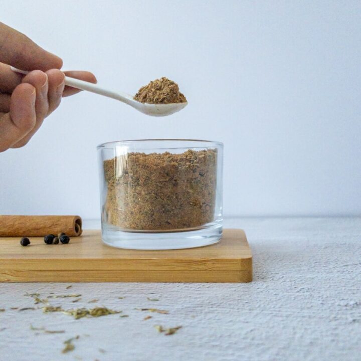 Jerk seasoning in a jar on a table