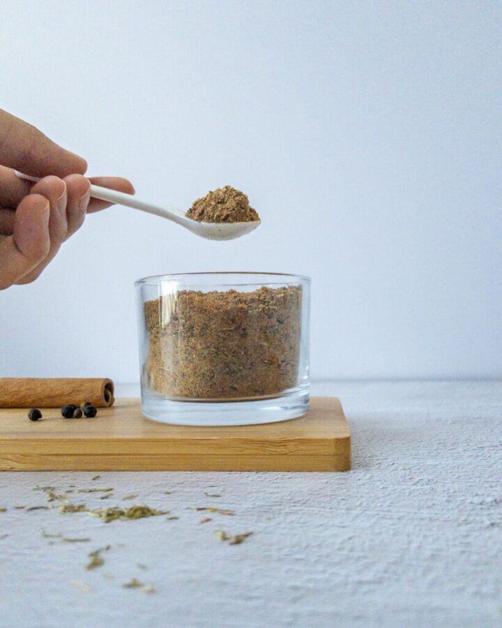Jerk seasoning in a jar on a table