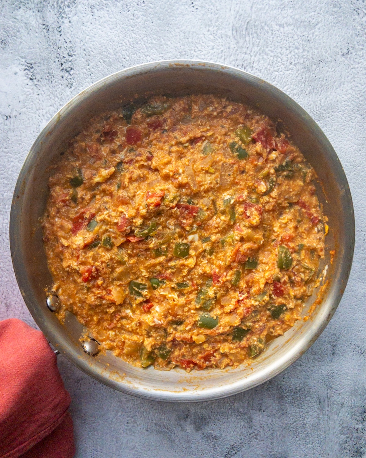 Menemen just finished cooking in the pan and ready to be topped