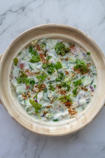 Mixed vegetable raita served in a bowl