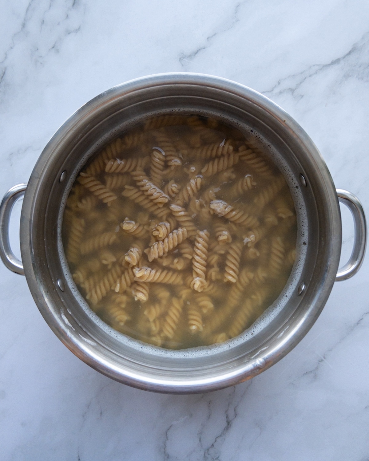 pasta being boiled in a pot