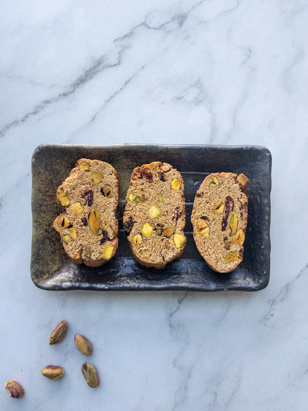 Pistachio and Cranberry Biscotti seen on a plate