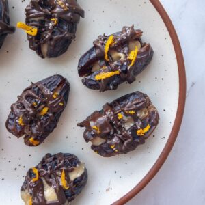 dates stuffed with tahini and topped with melted chocolate