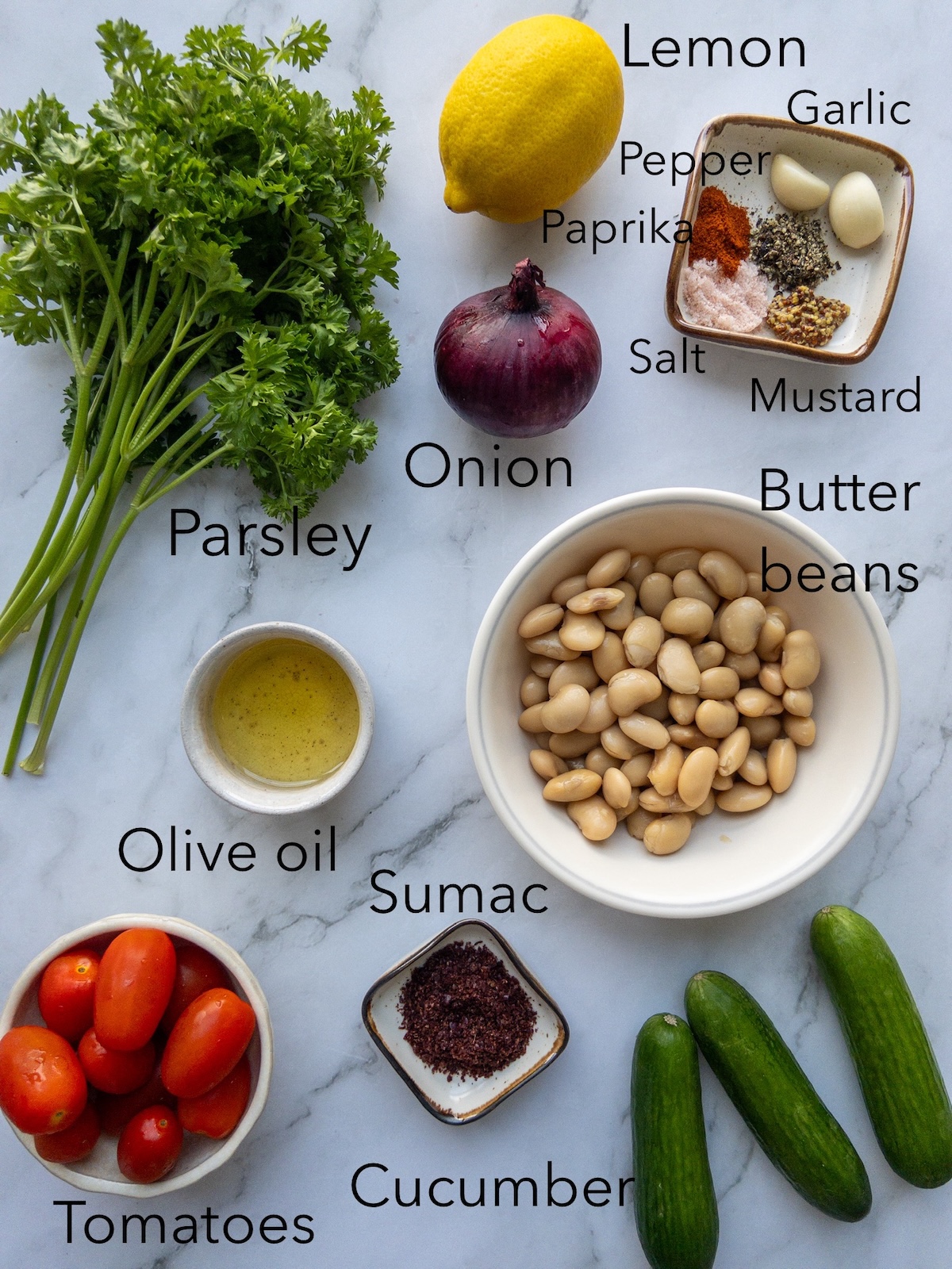 ingredients for butter bean salad on a table