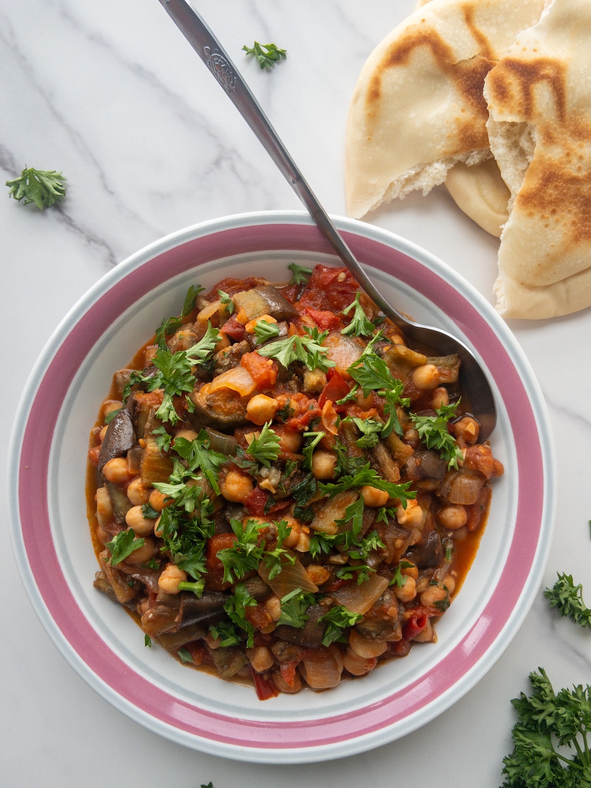 Maghmour, or Lebanese Moussaka served in a bowl with pita bread