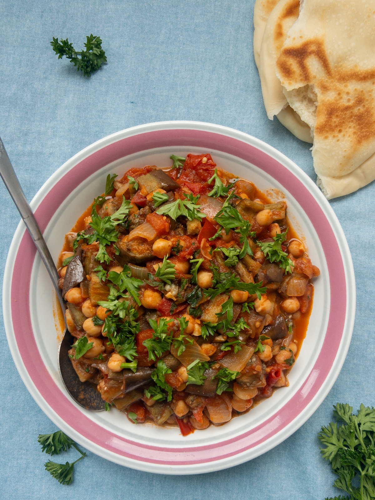 Maghmour, or Lebanese Moussaka served in a bowl with pita bread