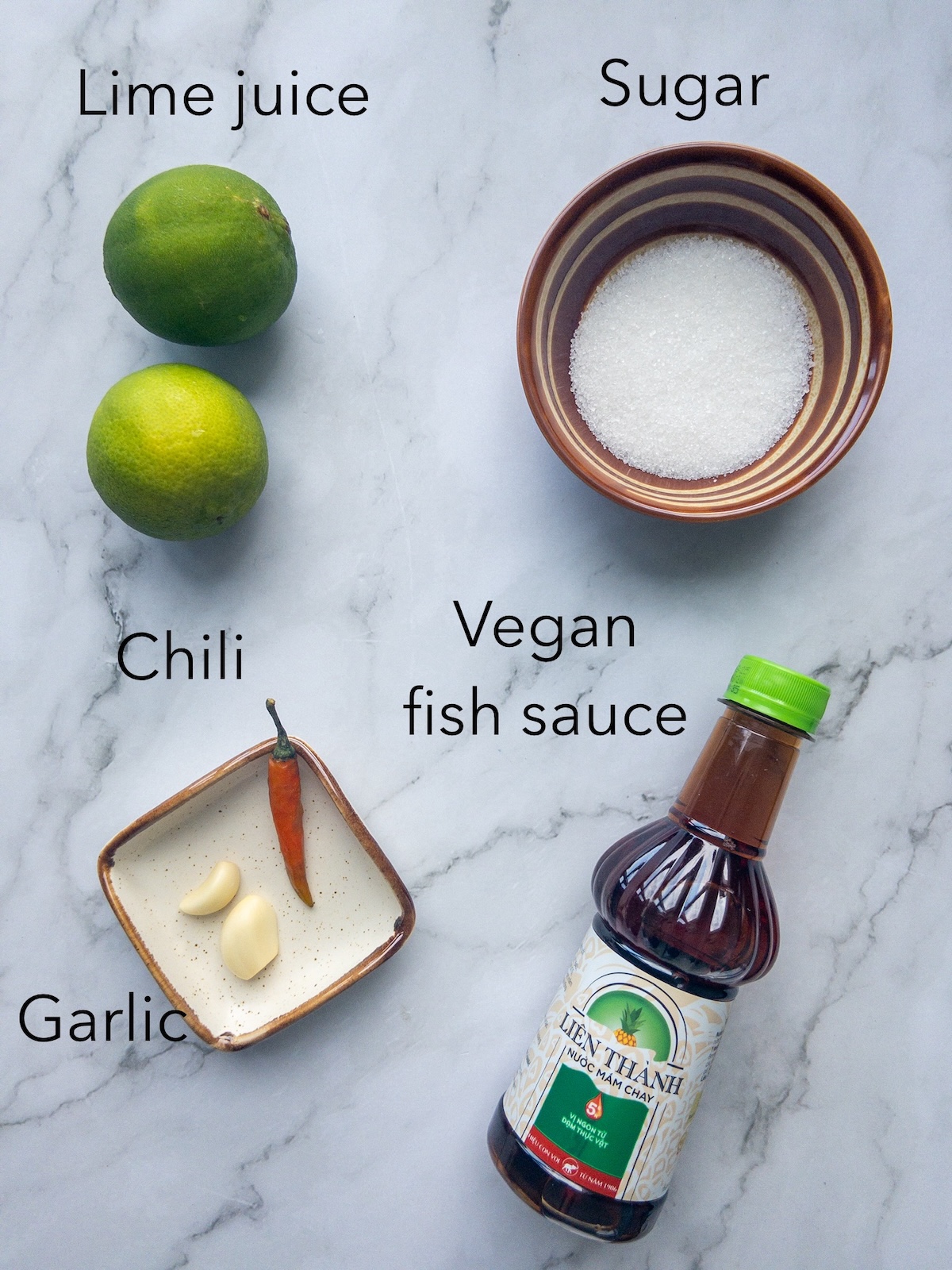 Ingredients to make vegan nuoc cham laying on a table