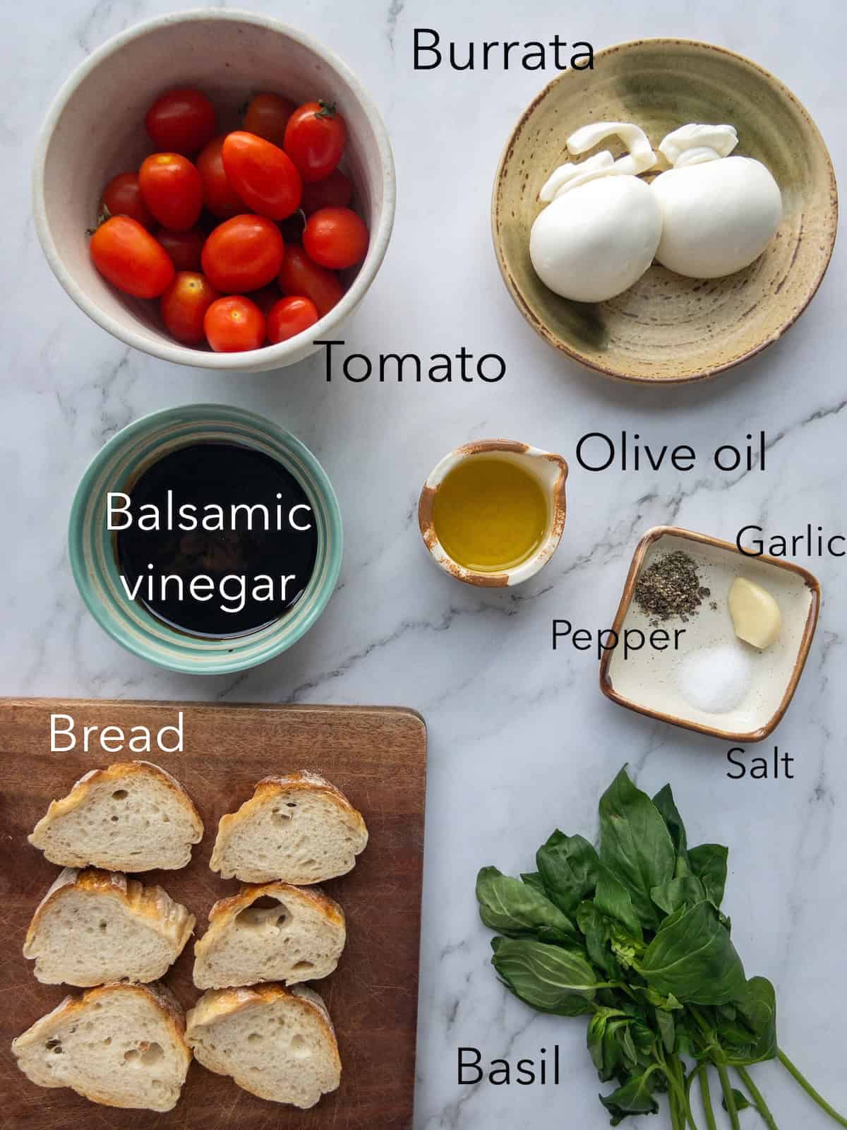 Ingredients for Burrata Bruschetta on a table