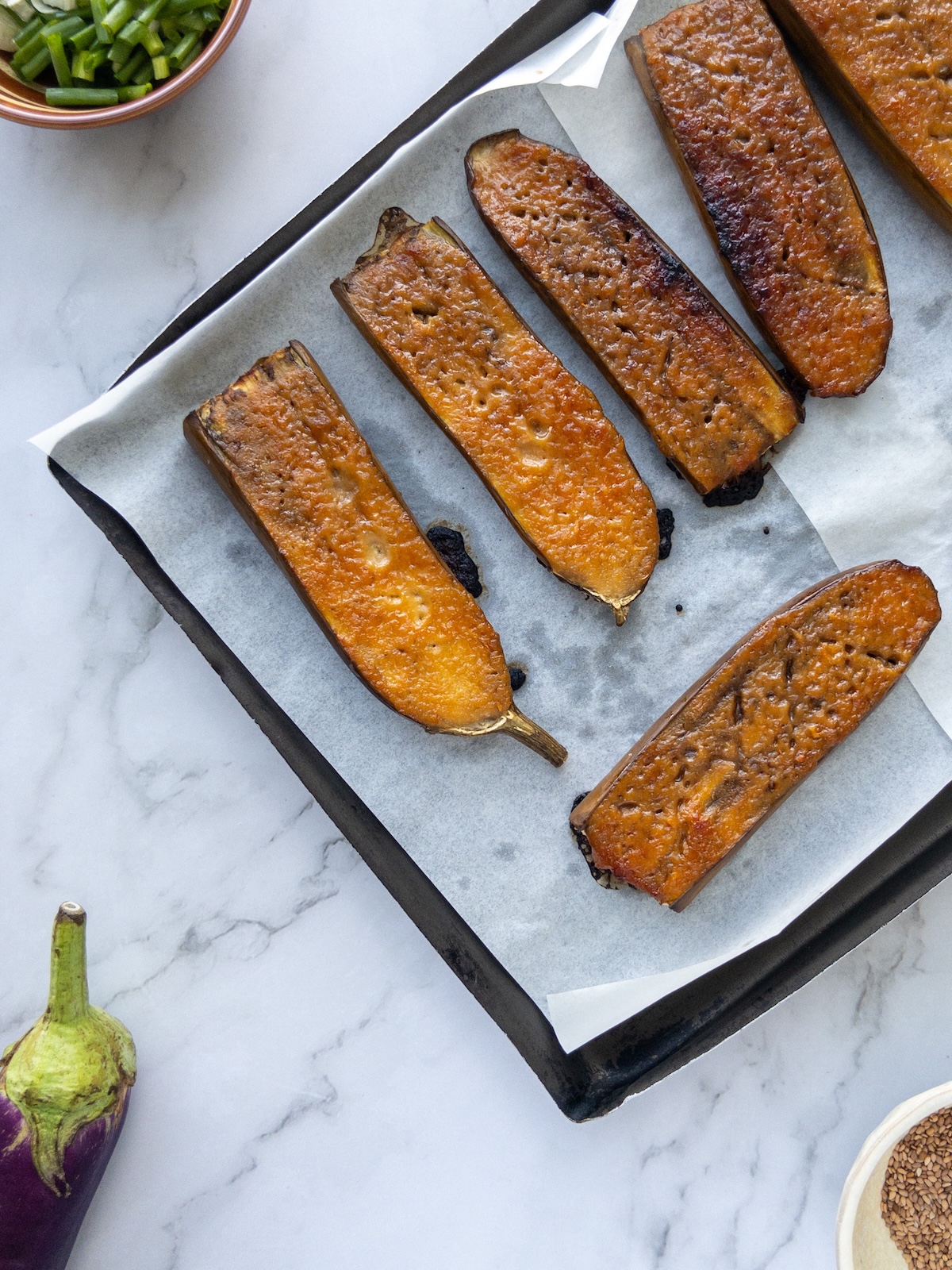 Sticky Aubergines after baking on a baking tray