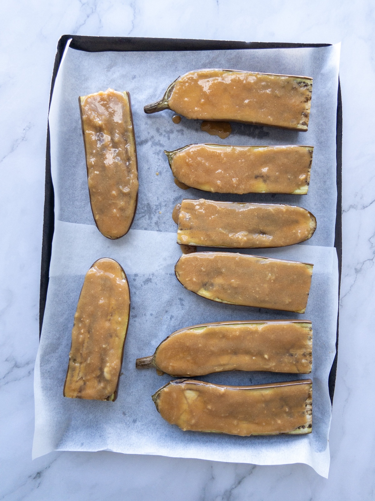 Aubergines coated with miso sauce.