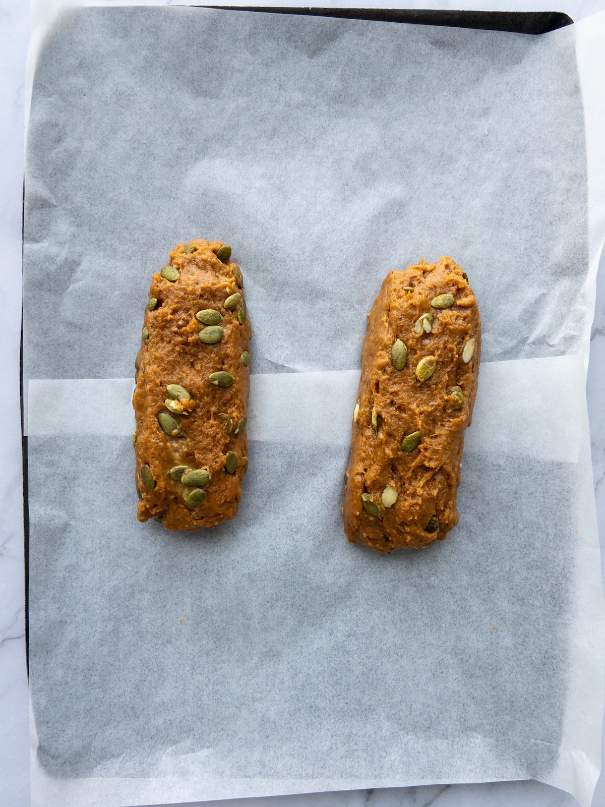 Pumpkin Biscotti dough rolled into logs before baking