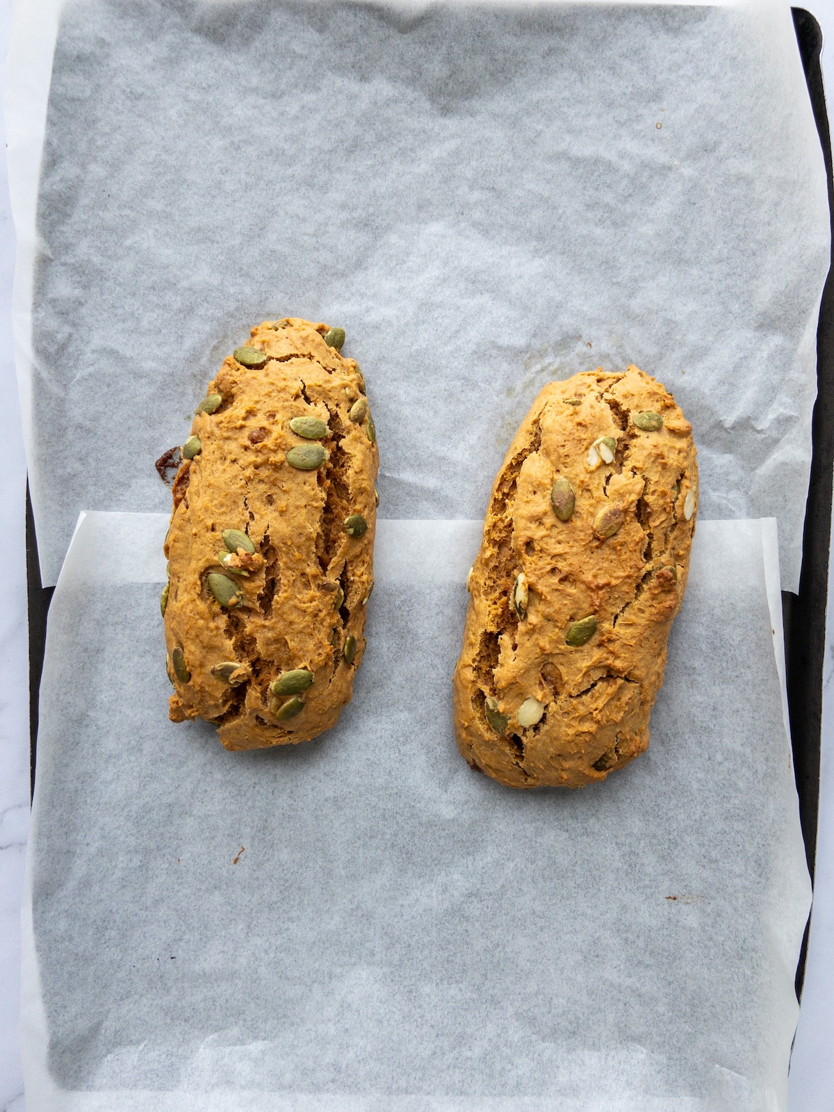 Pumpkin Biscotti dough rolled into logs after baking