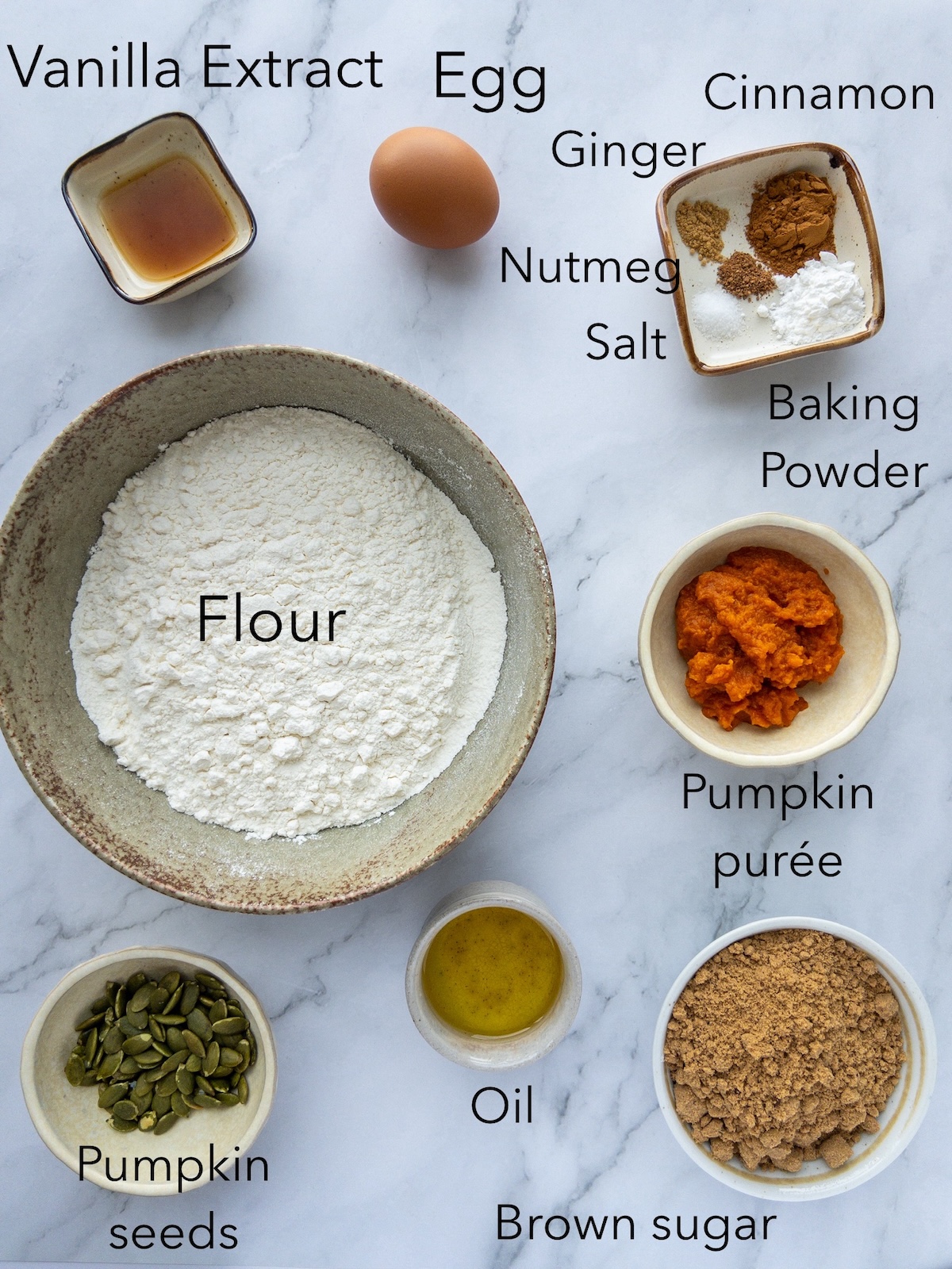 Pumpkin Biscotti Ingredients in bowls on a table